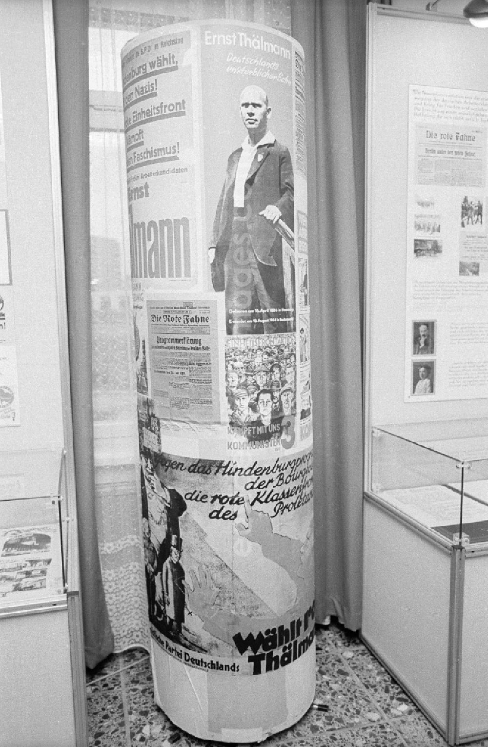 GDR photo archive: Berlin - Opening of the history cabinet of today's House of Liberation in Leninallee, today's Landsberger Allee 563 in the district Marzahn in Berlin, the former capital of the GDR, German Democratic Republic. Column with posters about Ernst Thaelmann in the exhibition