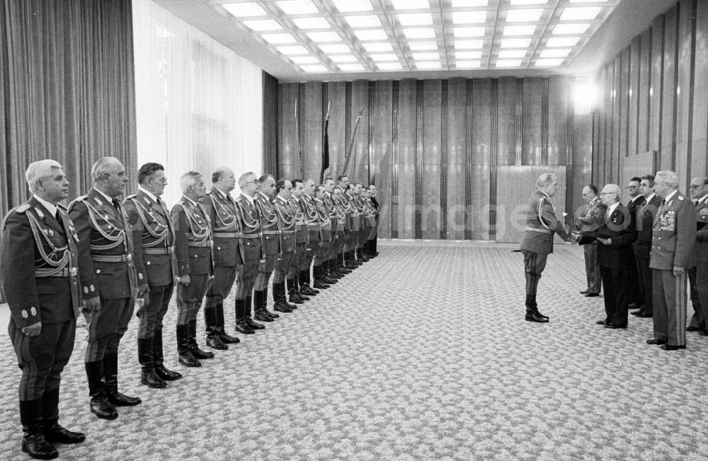 GDR photo archive: Berlin - Ceremony for the appointment and promotion of colonels and generals in the State Council building by the Chairman of the State Council and General Secretary of the SED Central Committee Erich Honecker in the presence of Defense Minister Army General Heinz Hoffmann and Egon Krenz in the Mitte district of Berlin East Berlin on the territory of the former GDR, German Democratic Republic