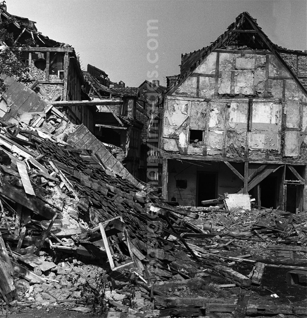 GDR photo archive: Halberstadt - Rubble and ruins Rest of the facade and roof structure of the half-timbered house am Seidenbeutel by demolition in Halberstadt in the state Saxony-Anhalt on the territory of the former GDR, German Democratic Republic