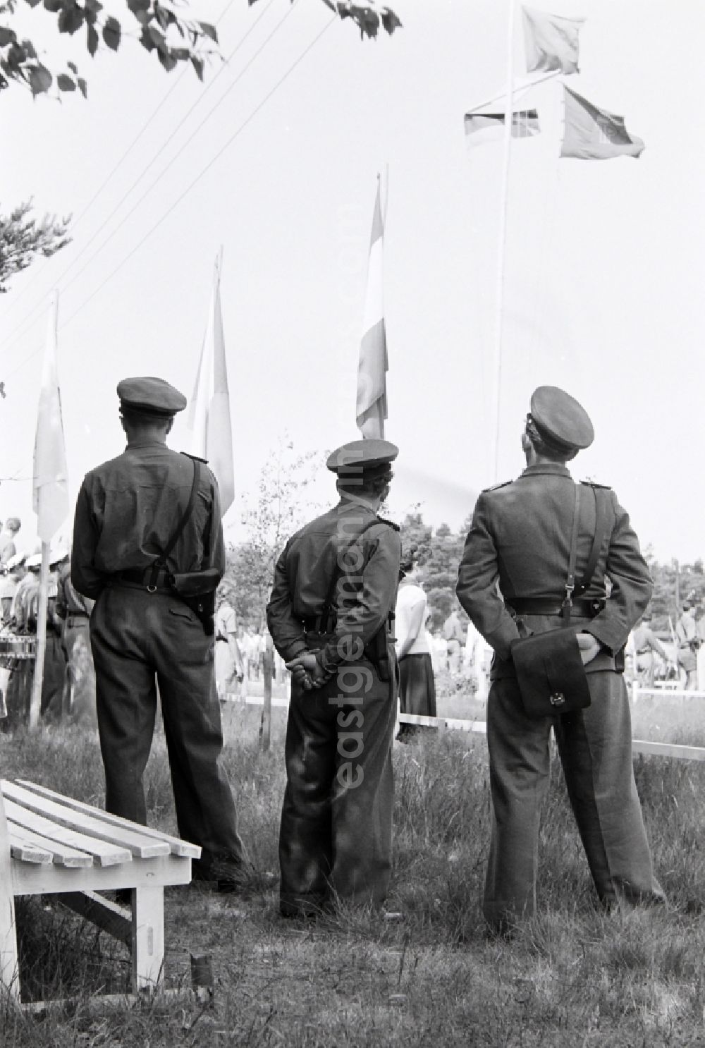 GDR photo archive: Prerow - Summer camp operation with pupils and teenagers in the summer camp Kim Ir Sen of the pioneer organization Ernst Thaelmann in Prerow in the state Mecklenburg-Western Pomerania on the territory of the former GDR, German Democratic Republic. With homemade phantasy uniforms and pre-military drill and ante-exercises, the communist tradition was commemorated in the Spanish Civil War