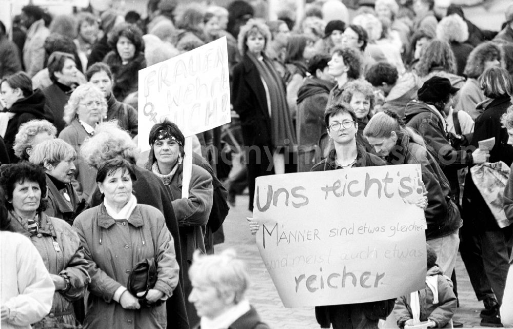 GDR photo archive: Berlin - Women demonstrate on Women's Day in front of the Red City Hall in Berlin. Demonstrators demonstrate and hold placards