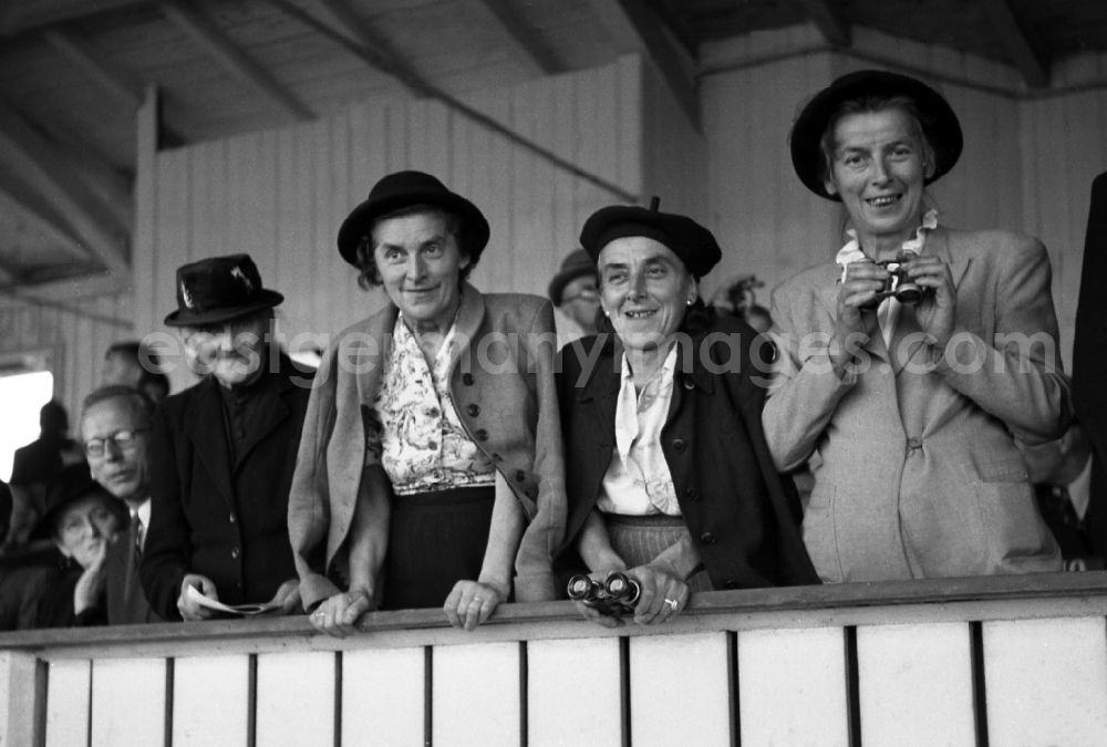 GDR picture archive: Dresden - Spectator with hat on the grandstand of the racecourse Dresden Seidnitz in the federal state Saxony on the territory of the former GDR, German Democratic Republic