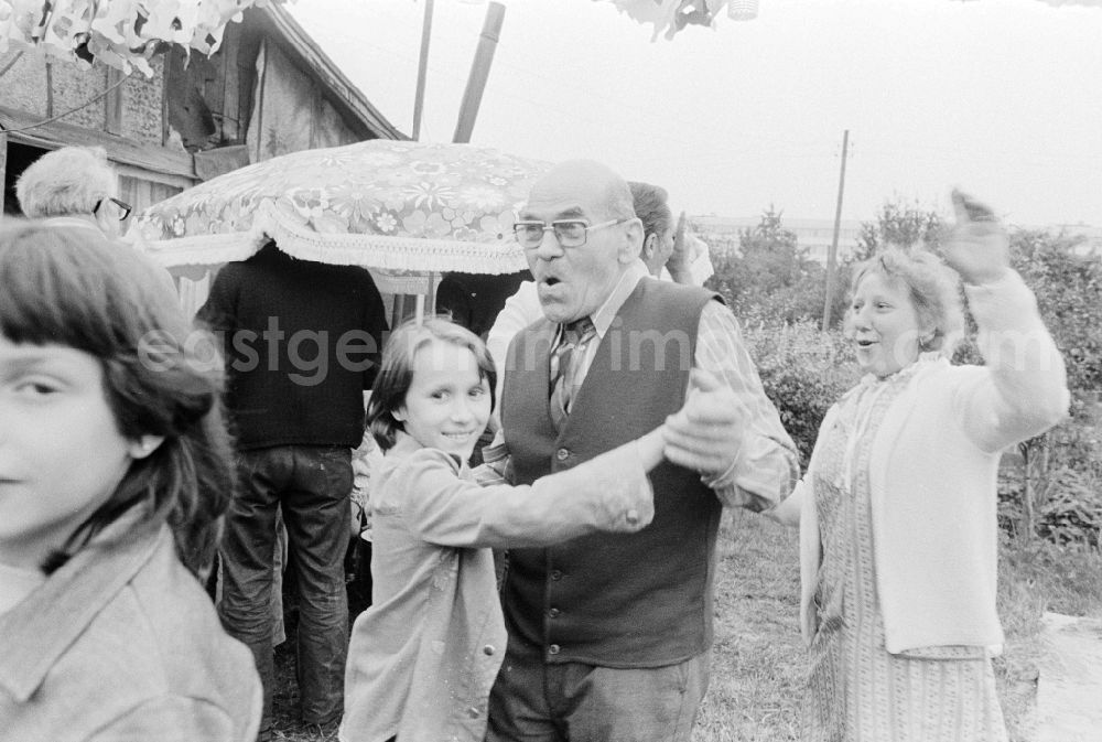 GDR photo archive: Berlin - Garden party in an allotment garden settlement in Berlin, the former capital of the GDR, German Democratic Republic