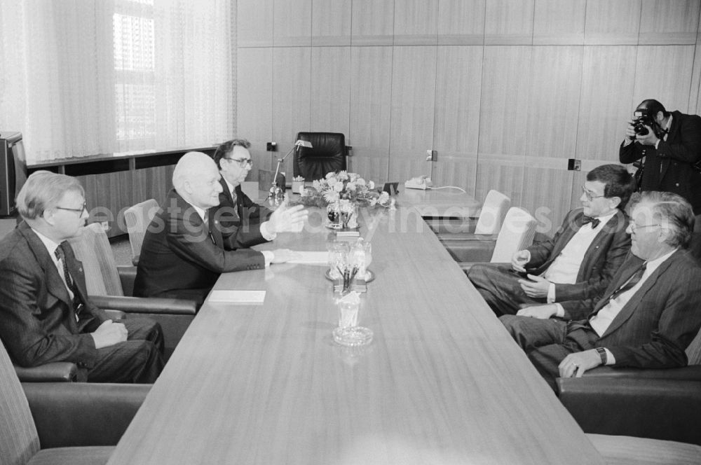 GDR photo archive: Berlin - Guenter Mittag (l), member of the Politburo and secretary of the Central Committee of the SED, adjusting Representative of the Chairman of the Council of State, received the Federal Minister for Research and Technology of the Federal Republic of Germany, Dr. Heinz Riesenhuber (2nd from right), for an interview. Also present were Dr. Herbert Weiz (2nd from left), Minister of Science and Technology and Deputy Chairman of the Council of Ministers, and the Head of the Permanent Mission of the FRG in the GDR, Dr. Franz Bertele (r)