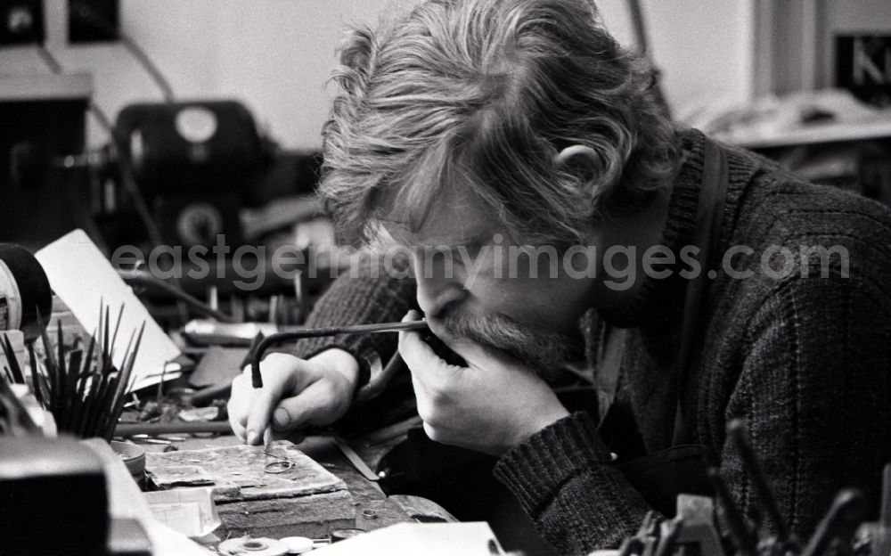 GDR image archive: Berlin - Goldsmith at work making jewelry in the district Mitte in Berlin, the former capital of the GDR, German Democratic Republic