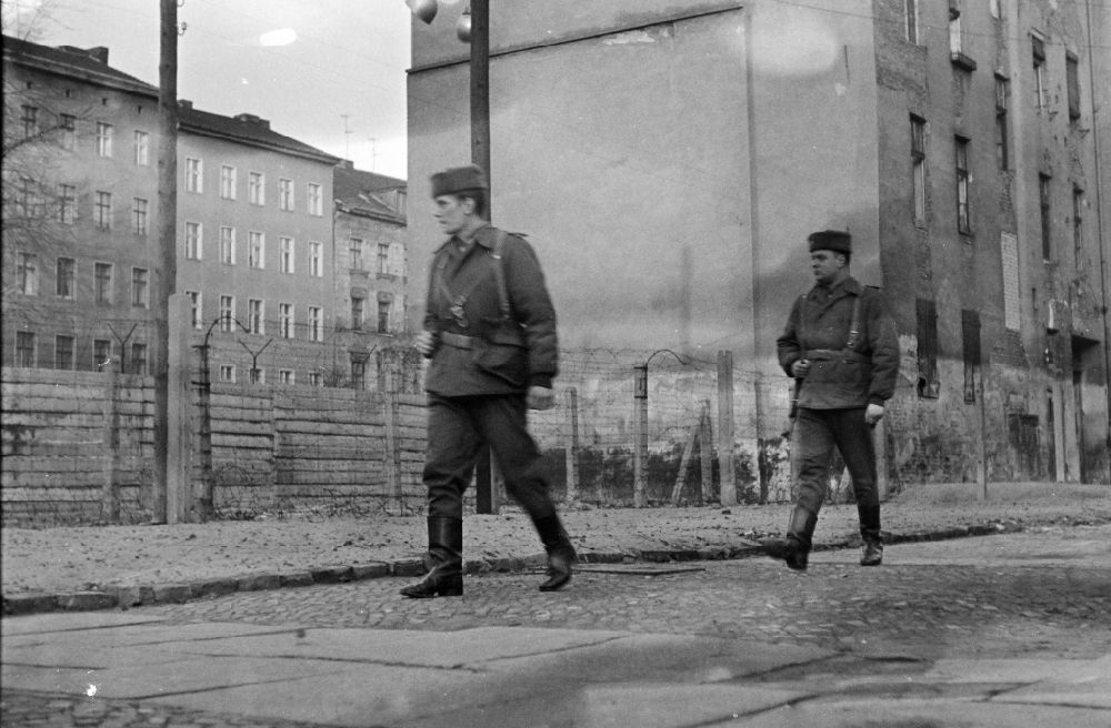 Berlin: Border security fortifications with patrolling soldiers on street Bernauer Strasse in the district Mitte in Berlin Eastberlin on the territory of the former GDR, German Democratic Republic