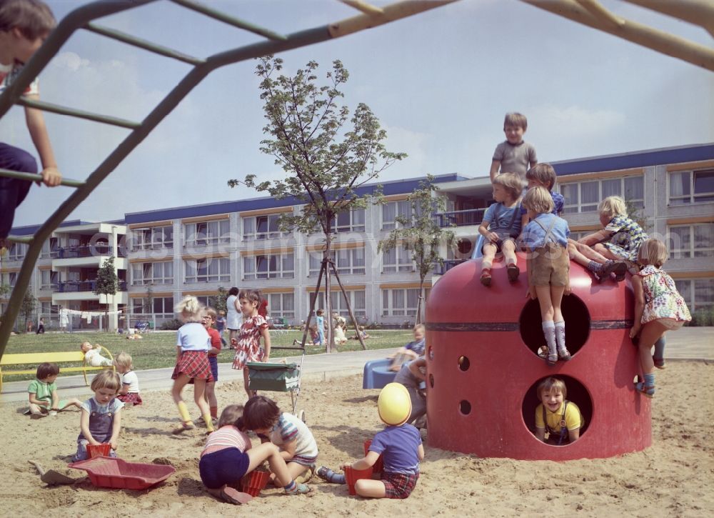 Rostock: Fun and games for children and teenagers on a climbing arch - playground in Rostock in the state Mecklenburg-Western Pomerania on the territory of the former GDR, German Democratic Republic