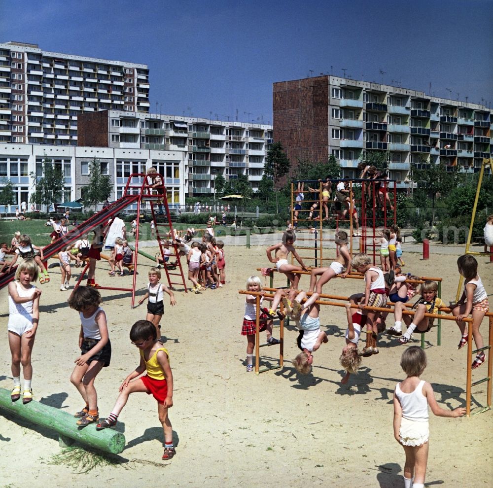 Rostock: Fun and games for children and teenagers on a climbing arch - playground in Rostock in the state Mecklenburg-Western Pomerania on the territory of the former GDR, German Democratic Republic