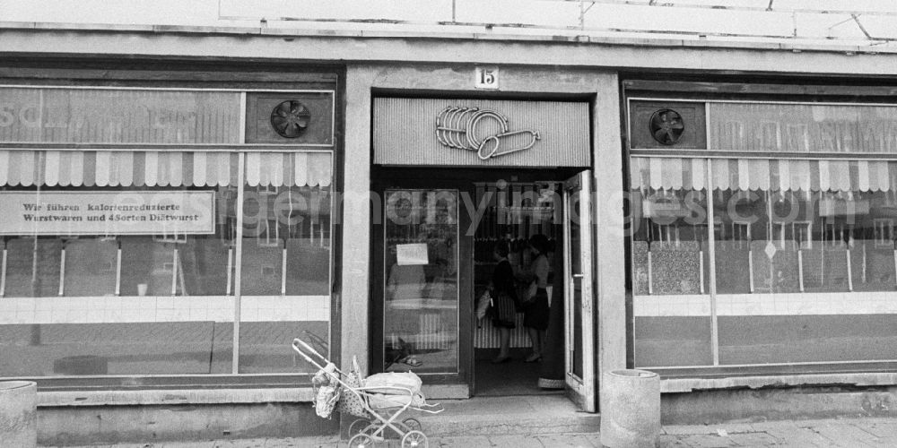 GDR picture archive: Berlin - House front and Shopwindow for groceries retail store in the borough Berlin-Pankow or Prenzlauer Berg