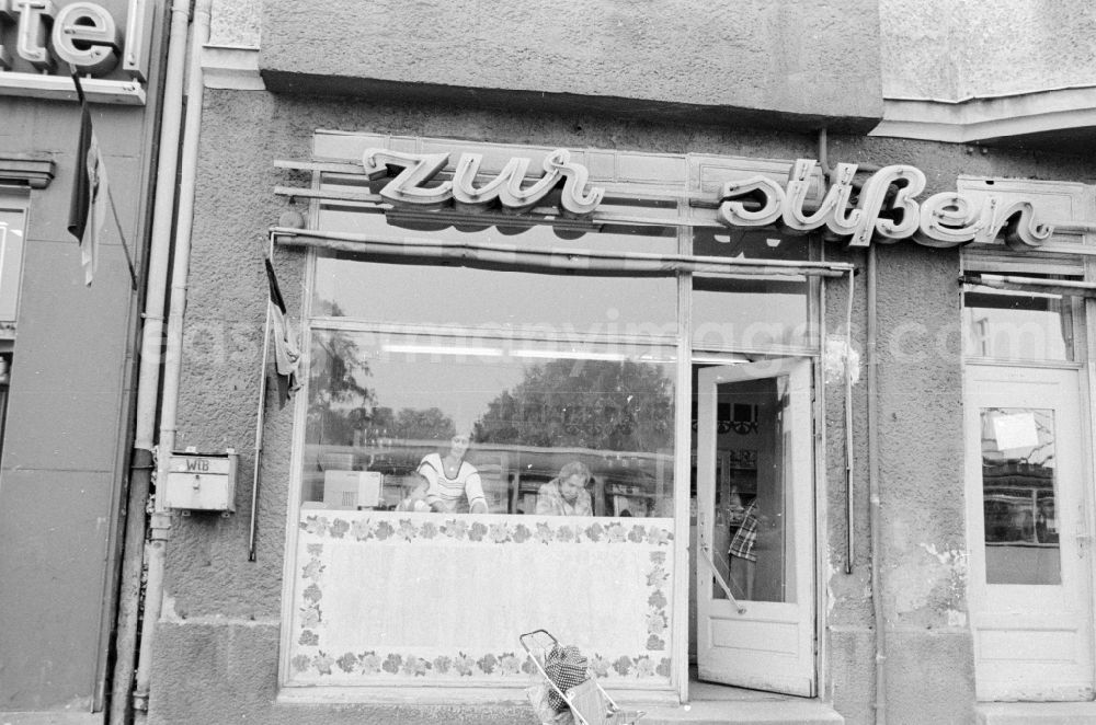 GDR image archive: Berlin - House front and Shopwindow for retail store in the borough Berlin-Pankow or Prenzlauer Berg
