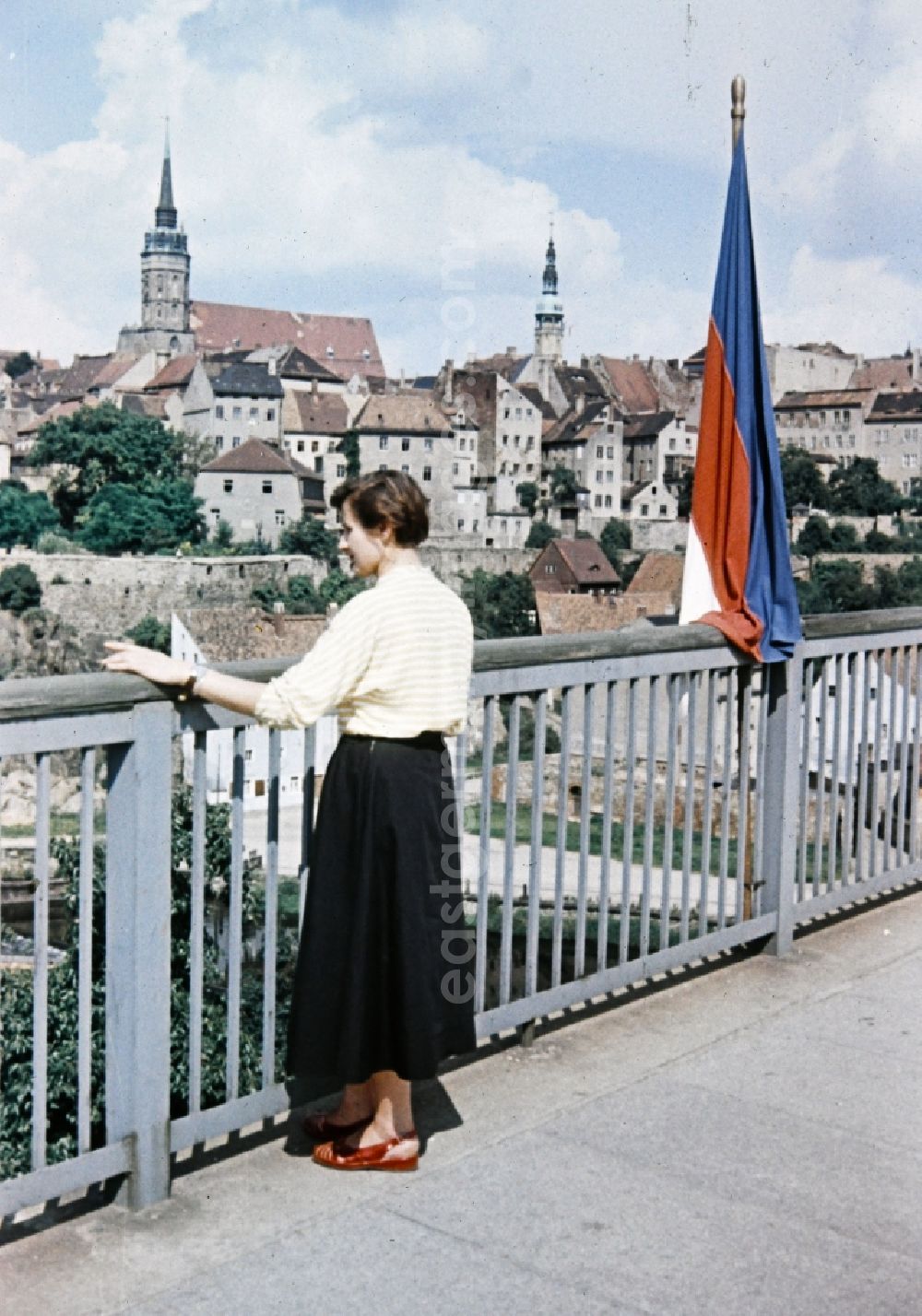 GDR photo archive: Bautzen - Woman on bridge on historic old town in the center in Bautzen in the state Saxony on the territory of the former GDR, German Democratic Republic