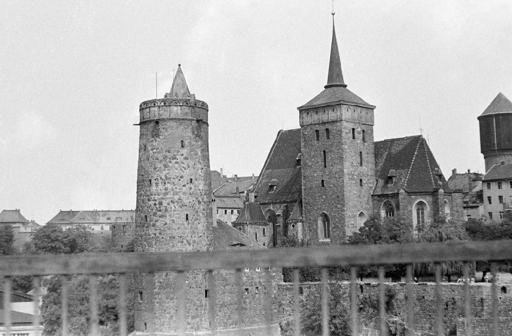 GDR photo archive: Bautzen - Sights of the historic old town in the city center at the city wall tower and the St. Michael's Church on the street Wendischer Kirchhof in Bautzen, Saxony in the territory of the former GDR, German Democratic Republic