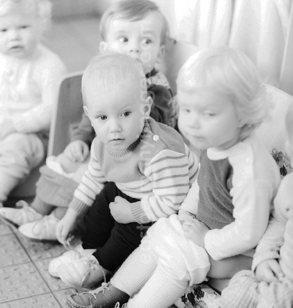 GDR picture archive: Berlin - Common pot sitting in a daycare center in Berlin, the former capital of the GDR, the German Democratic Republic