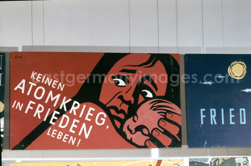 Dresden: Posters protesting against the war and the nuclear threat at the IVth Art Exhibition in Dresden, Saxony on the territory of the former GDR, German Democratic Republic. The slogan No nuclear war, live in peace! is written on one poster