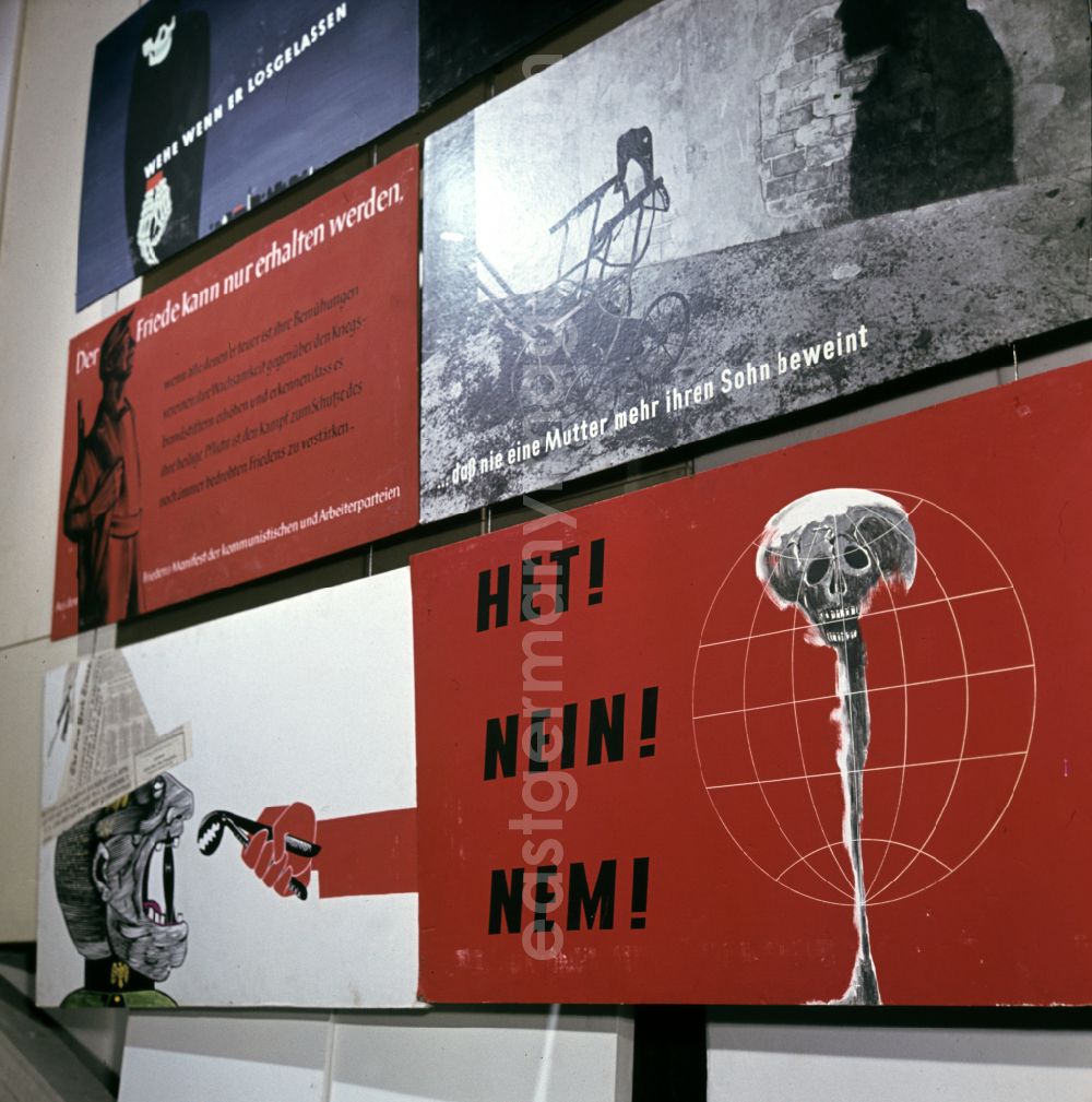 GDR image archive: Dresden - Posters protesting against the war and the nuclear threat at the IVth Art Exhibition in Dresden, Saxony on the territory of the former GDR, German Democratic Republic