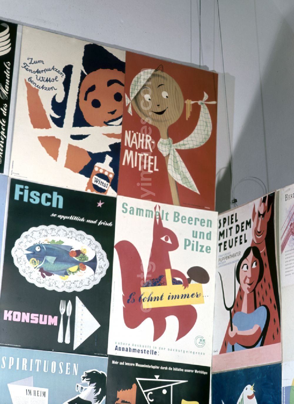 GDR picture archive: Dresden - Various advertising posters in the IV. Art Exhibition in Dresden, Saxony in the territory of the former GDR, German Democratic Republic