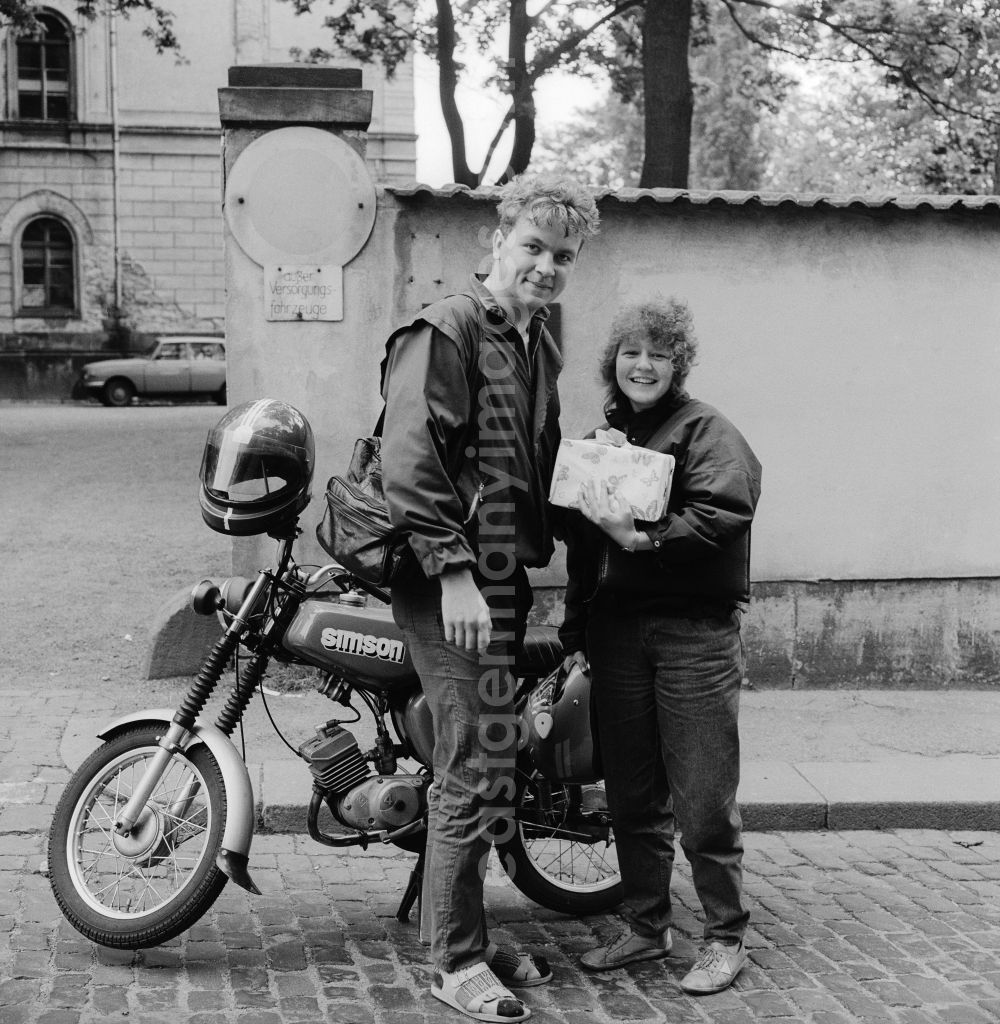 GDR image archive: Zittau - Two adolescents with a Simson motorbike in Zittau in the state Saxony on the territory of the former GDR, German Democratic Republic