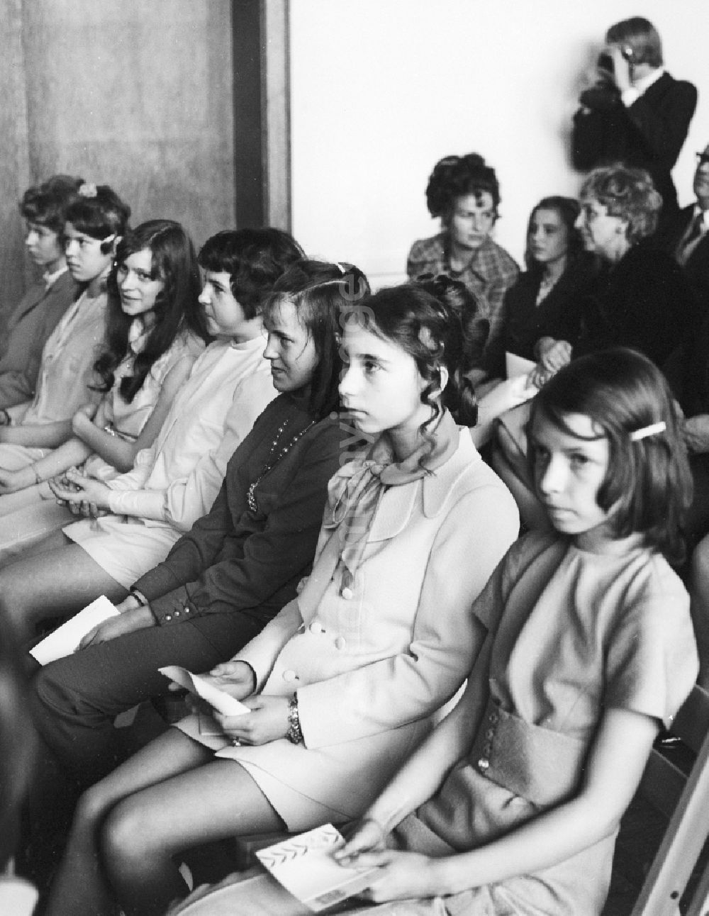 GDR photo archive: Berlin - Youth Dedication Ceremony participants sitting on chairs and waiting in Berlin, the former capital of the GDR, the German Democratic Republic