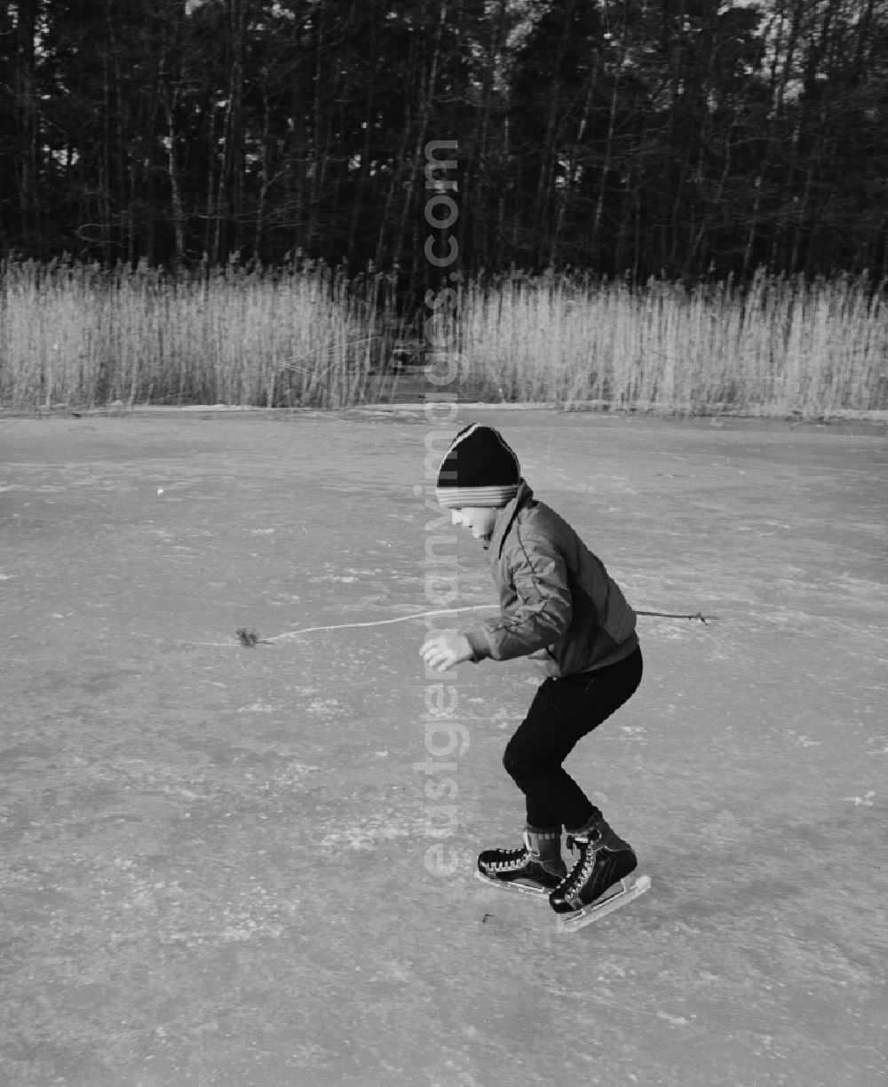 Grünheide (Mark): Boy skating on a frozen lake in Green Heath (Mark) in today's Brandenburg
