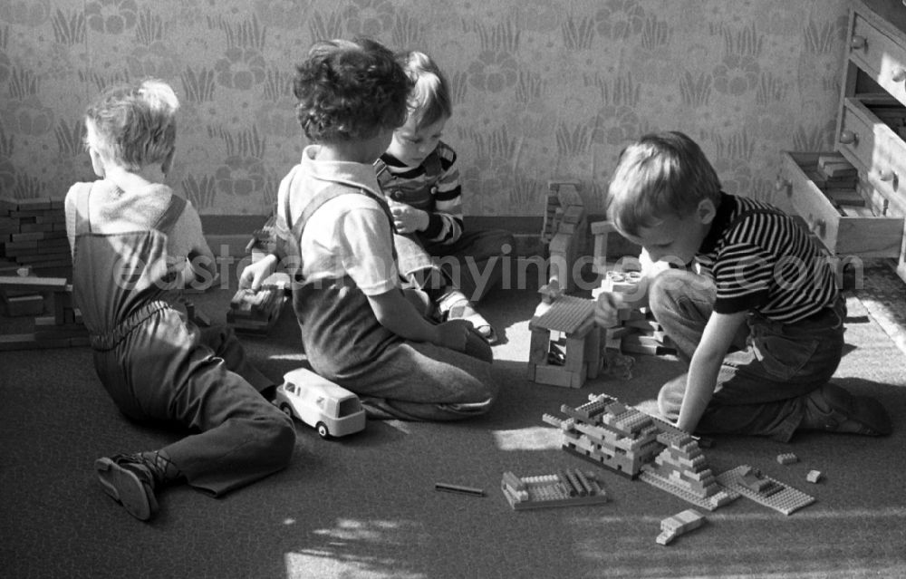 GDR image archive: Berlin - Boys playing with building blocks and FORMO bricks in a kindergarten in Berlin Eastberlin on the territory of the former GDR, German Democratic Republic