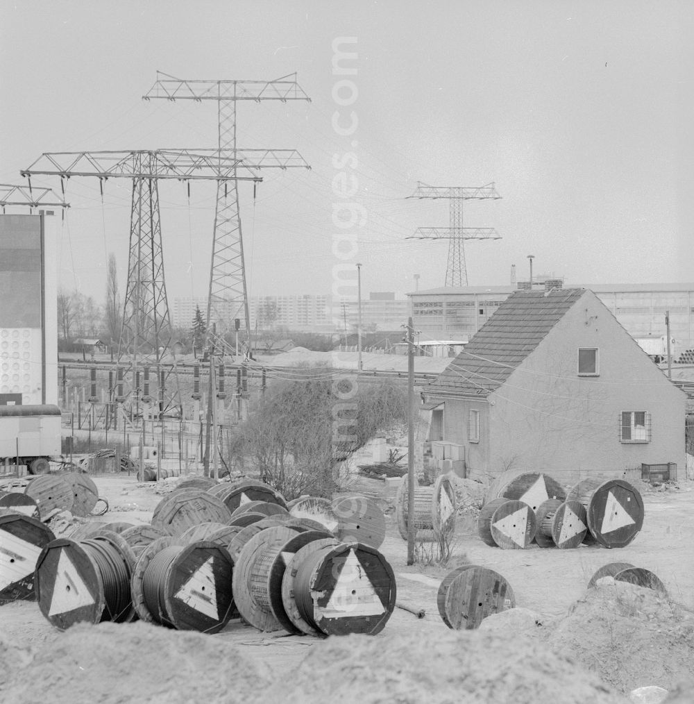 GDR photo archive: Berlin - Cable drums and high-voltage power lines on Maerkische Allee in the district of Marzahn in Berlin, the former capital of the GDR, German Democratic Republic