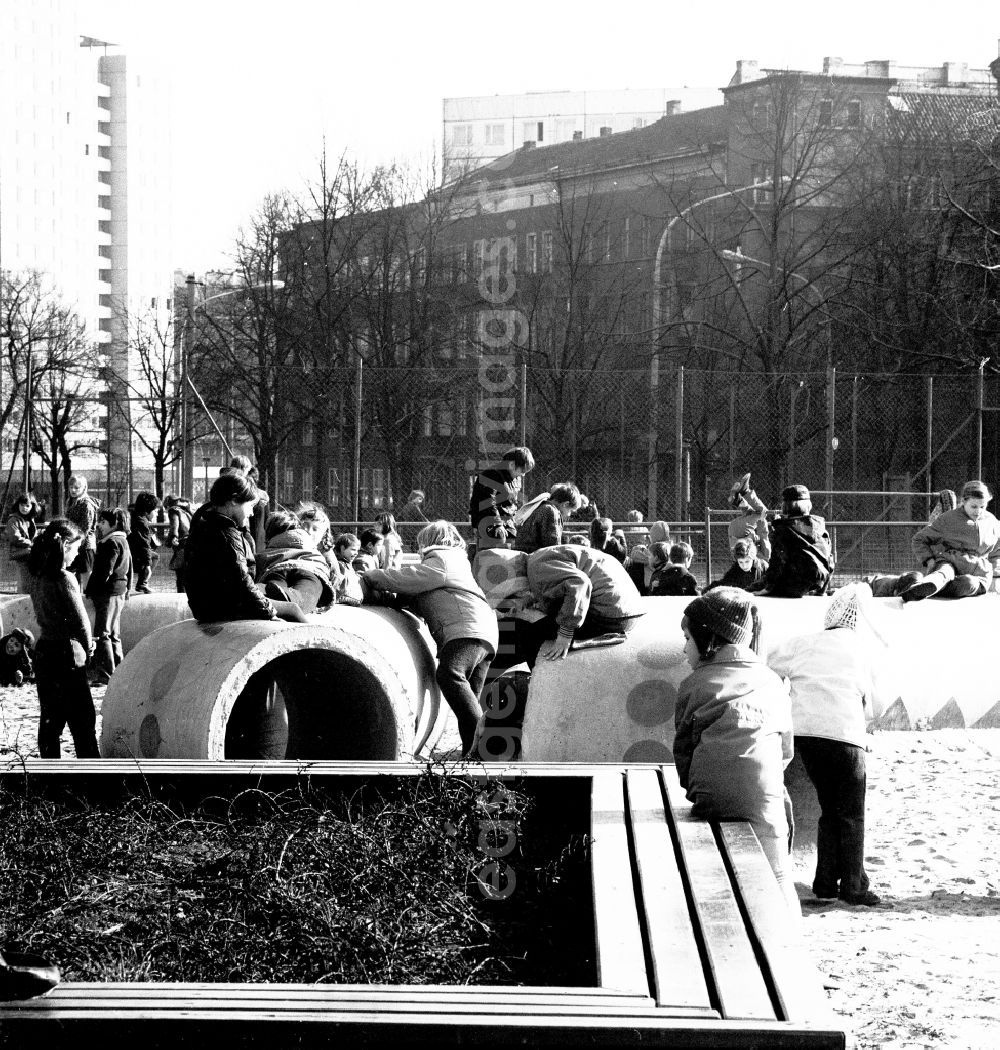 Berlin: Children play on a playground in the national park Friedrich's grove in Berlin, the former capital of the GDR, German democratic republic