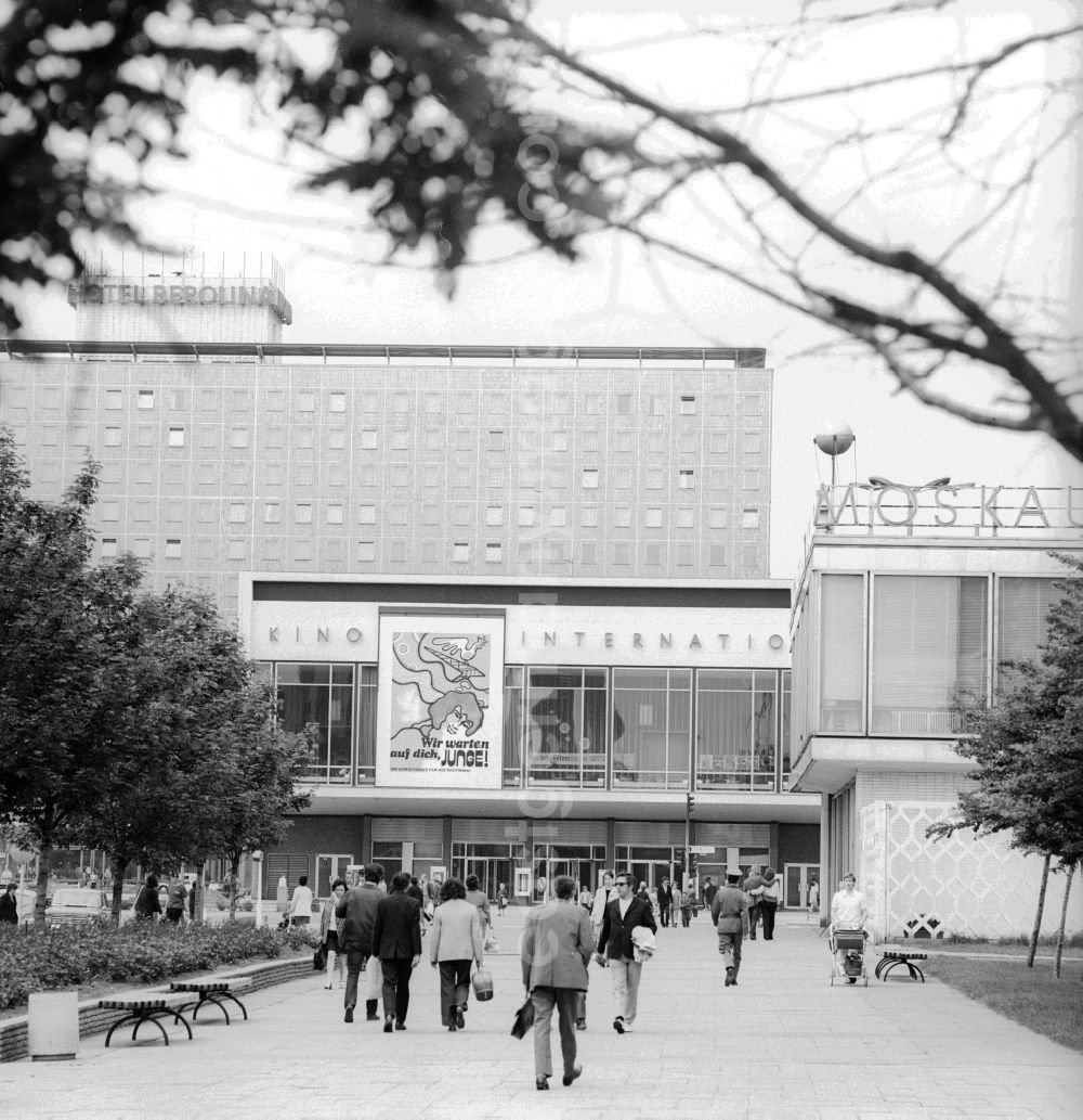 GDR picture archive: Berlin - The cinema INTERNATIONAL with the film poster for the Soviet film We wait for you boy in the Karl Marx Allee in Berlin, the former capital of the GDR, German democratic republic. In the background the hotel BEROLINA