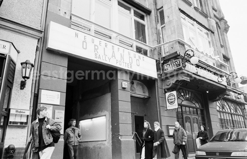 GDR picture archive: Berlin - New opening of the Scala cinema - building front at Friedrichstrasse 112 a Friedrichstrasse in the district Mitte in Berlin, Germany. Sign saying New opening Orlando Sally Potter above the entrance next to The Oscar Wilde Traditional Irish Bar