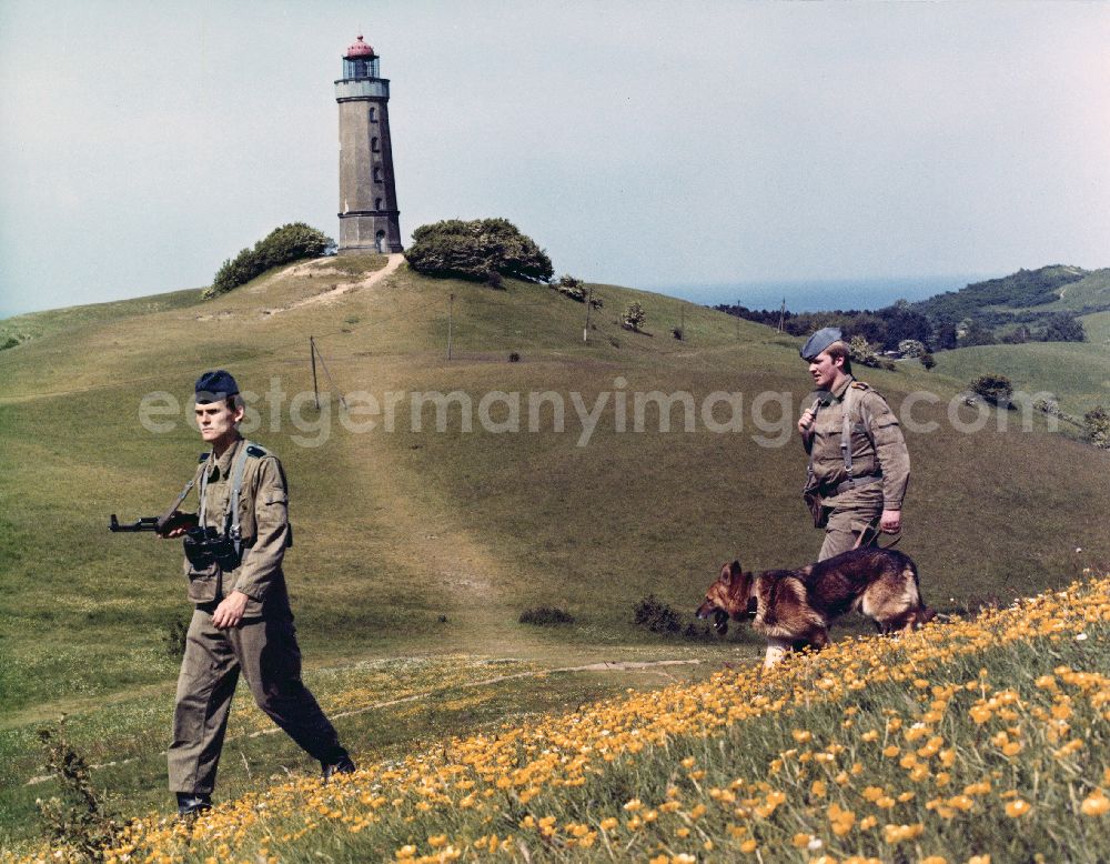 GDR picture archive: Sassnitz - Landside border control of the Baltic Sea coast by members of the border brigade Coast of East German border guards. Here to see a pair of guards, equipped with machine gun AK-47