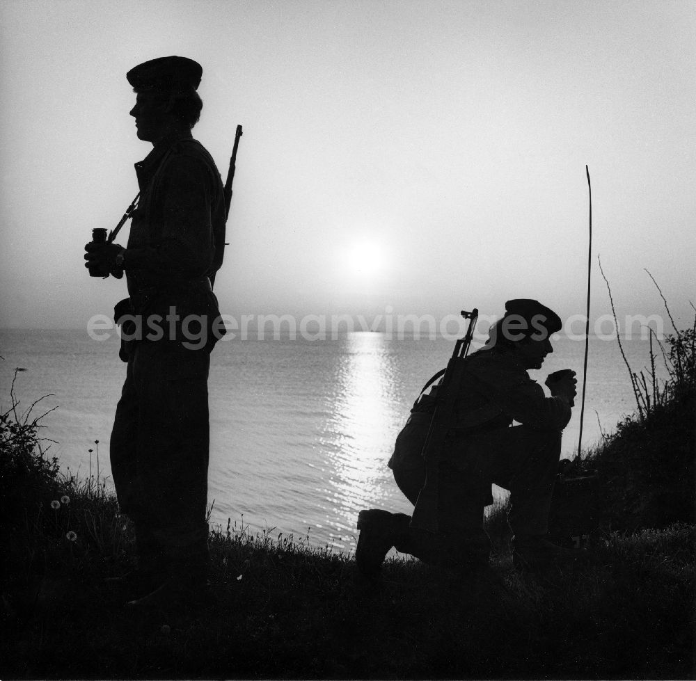 GDR photo archive: Sassnitz - Landside border control of the Baltic Sea coast by members of the border brigade Coast of East German border guards. Here to see a pair of guards, equipped with machine gun AK-47