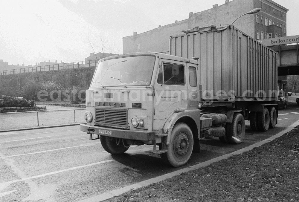 Berlin: A truck of the type Jelcz 315 with an oversea container on the Frankfurt avenue in Berlin, the former capital of the GDR, German democratic republic