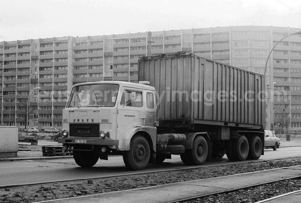 GDR photo archive: Berlin - A truck of the type Jelcz 315 with an oversea container on the Lichtenberger street in Berlin, the former capital of the GDR, German democratic republic