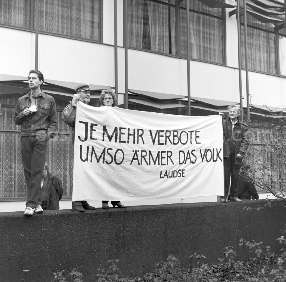 GDR image archive: Berlin - Banner with the slogan The more prohibitions all the poorer the people is held by GDR citizens. On 4 November 1989 came on the Alexanderplatz in Berlin with about a million subscribers to the largest demonstration in the history of the GDR