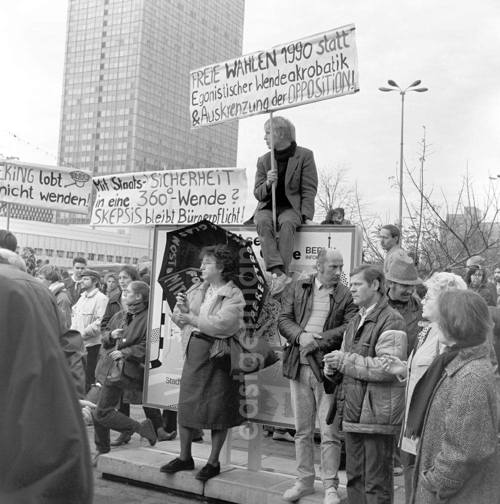 GDR photo archive: Berlin - On 4 November 1989 came on the Alexanderplatz in Berlin with about a million subscribers to the largest demonstration in the history of the GDR. Participants with posters and banners stand together