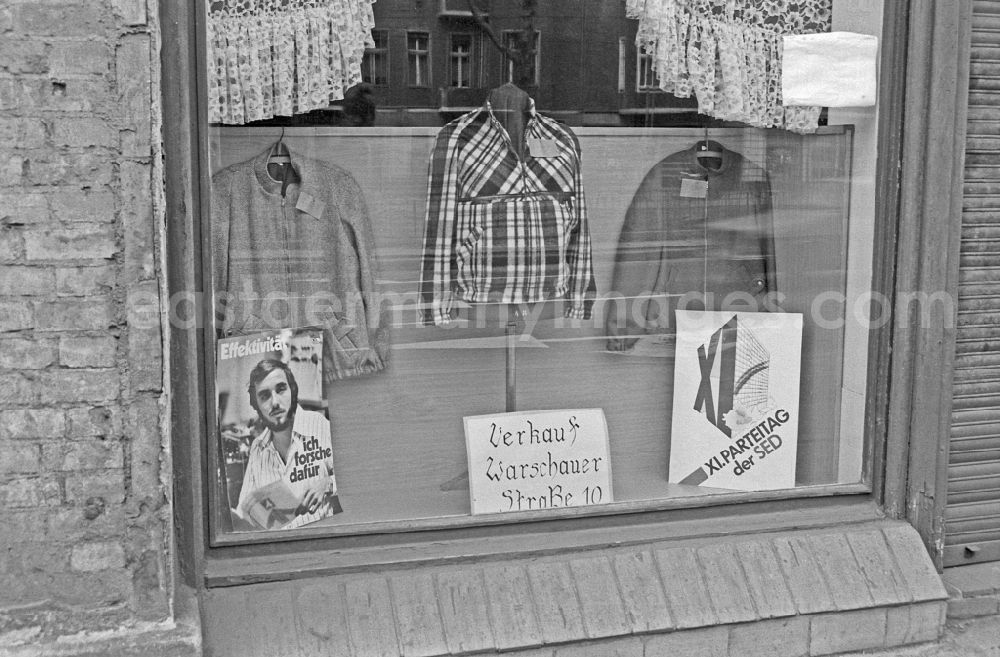 GDR image archive: Berlin - Ideologically oriented slogan and lettering and posters in a shop window in Berlin Eastberlin on the territory of the former GDR, German Democratic Republic