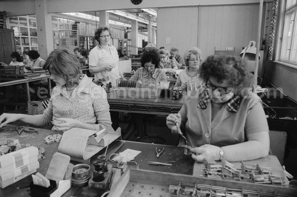 GDR photo archive: Berlin - PCBs soldering in nationally owned enterprise electrical appliances-works Berlin-Treptow Friedrich Ebert (EAW) in Berlin, the former capital of the GDR, the German Democratic Republic