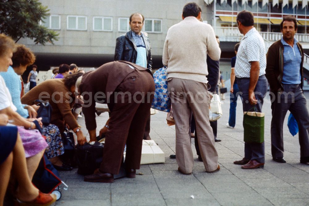 GDR photo archive: Berlin - People on Alexanderplatz in East Berlin in the area of the former GDR, German Democratic Republic