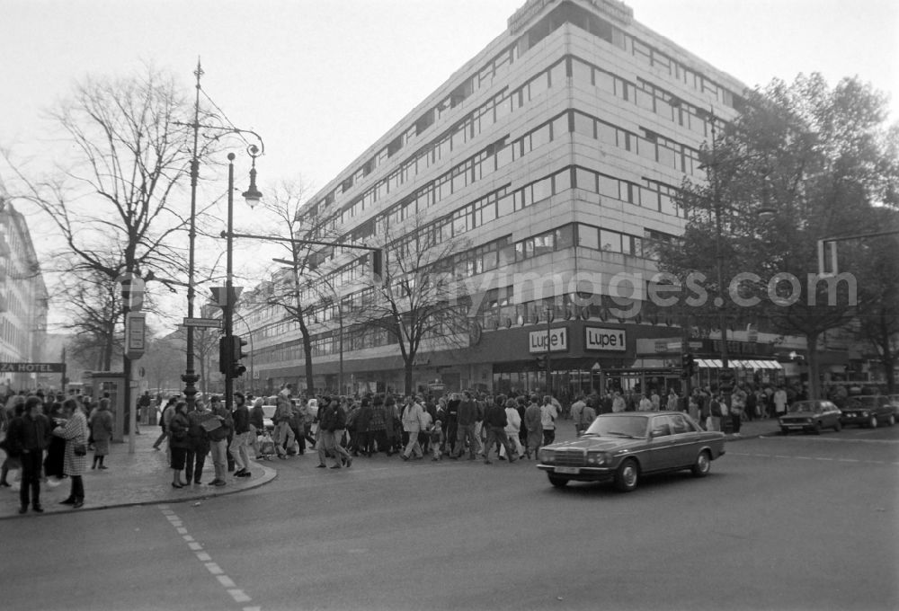 Berlin: People from the Westside and Eastside are travelling through Berlin-Charlotenburg shortly after the fall of the Wall