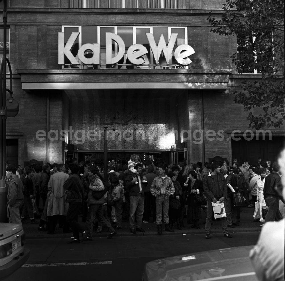 Berlin - Schöneberg: Crowd in front of the entrance to the Store of the West in Berlin - Schöneberg. The KaDeWe department store is a department store in Berlin with an upscale range and luxury goods was opened in 19