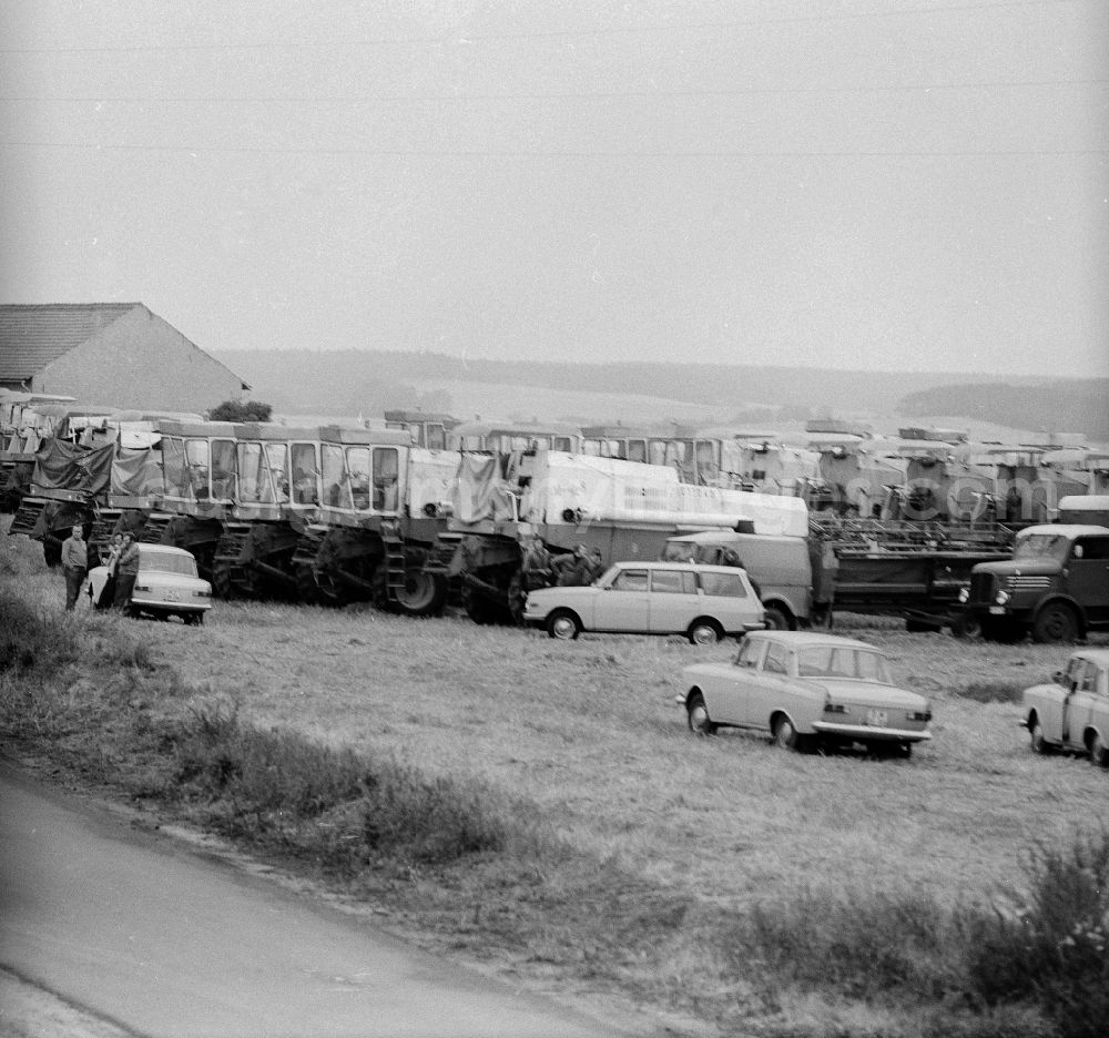 GDR image archive: Michendorf - Combine harvesters arm for the journey in the south districts of the republic to the harvest of grain in Michendorf in the federal state Brandenburg in the area of the former GDR, German democratic republic