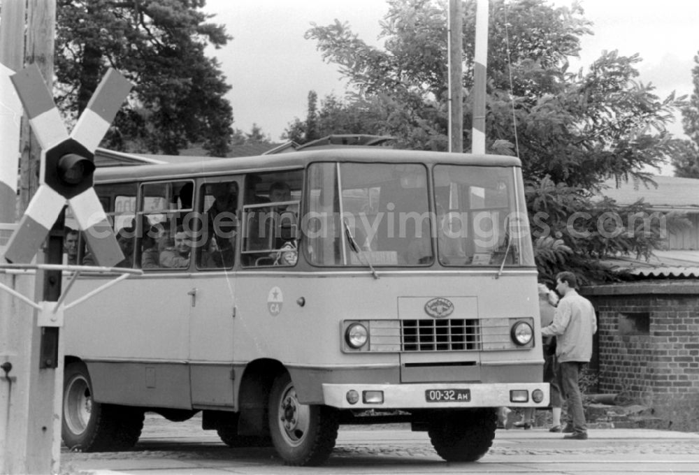 Wünsdorf: Soviet soldiers in uniform of the Red Army of the GSSD Group of Soviet Forces in Germany ride in a minibus military vehicle Progress-3