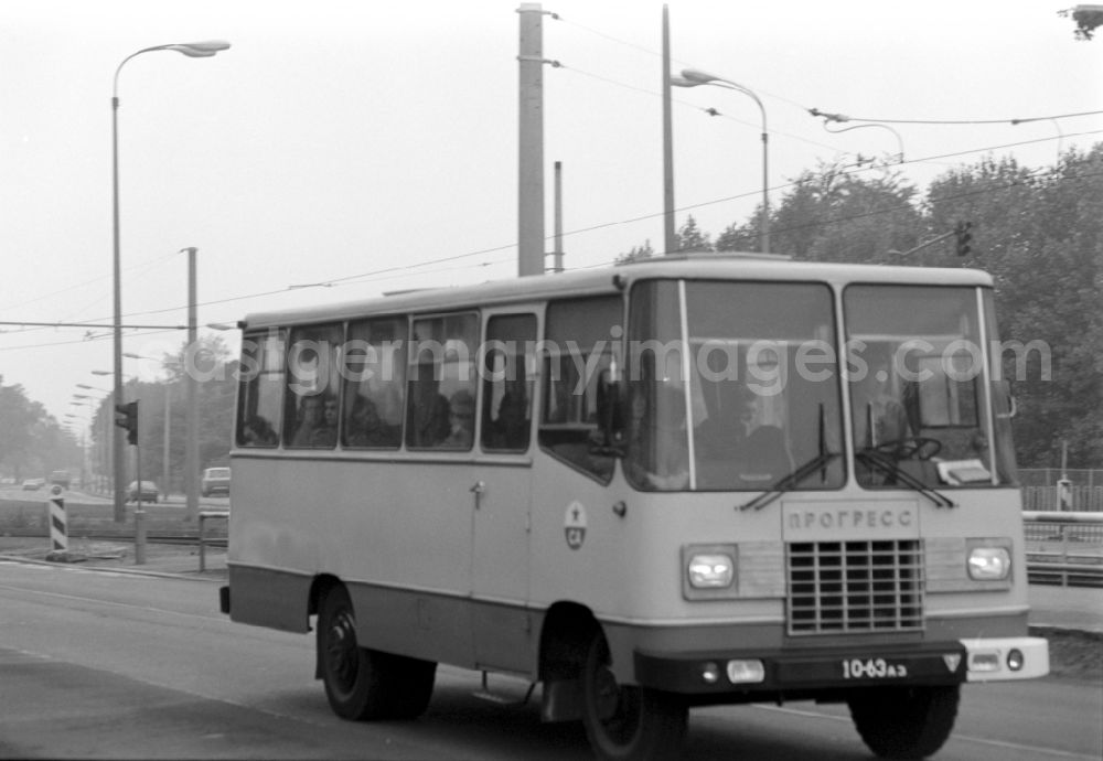 GDR photo archive: Wünsdorf - Soviet soldiers in uniform of the Red Army of the GSSD Group of Soviet Forces in Germany ride in a minibus military vehicle Progress-3