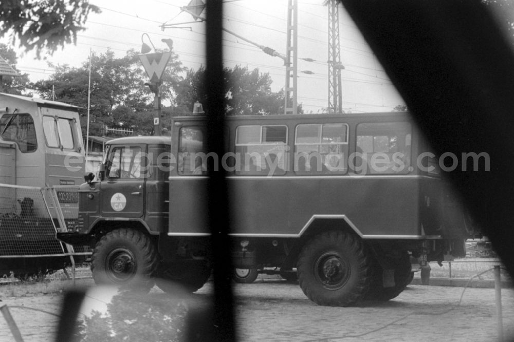 GDR image archive: Wünsdorf - Truck - truck as a military vehicle vom Typ KamAZ und ZIL der GSSD in Wuensdorf in the state Brandenburg on the territory of the former GDR, German Democratic Republic