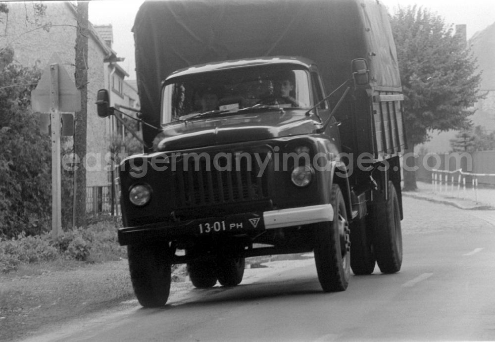 GDR photo archive: Wünsdorf - Truck - truck as a military vehicle vom Typ KamAZ und ZIL der GSSD in Wuensdorf in the state Brandenburg on the territory of the former GDR, German Democratic Republic