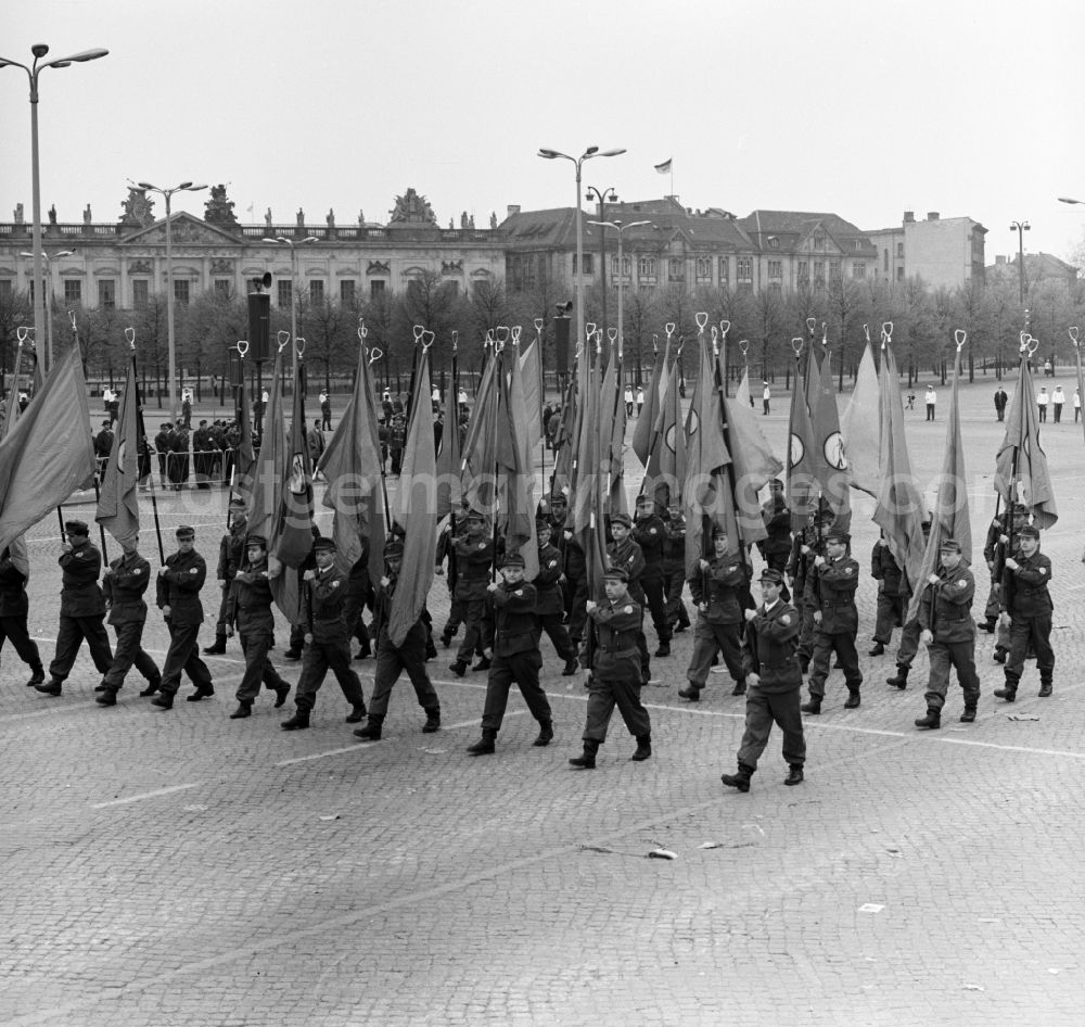 GDR picture archive: Berlin Mitte - The members of the fighting groups of the working class during the advance to the VIP stand to fight and holiday of the 1st On May Schlossplatz in Berlin - Mitte