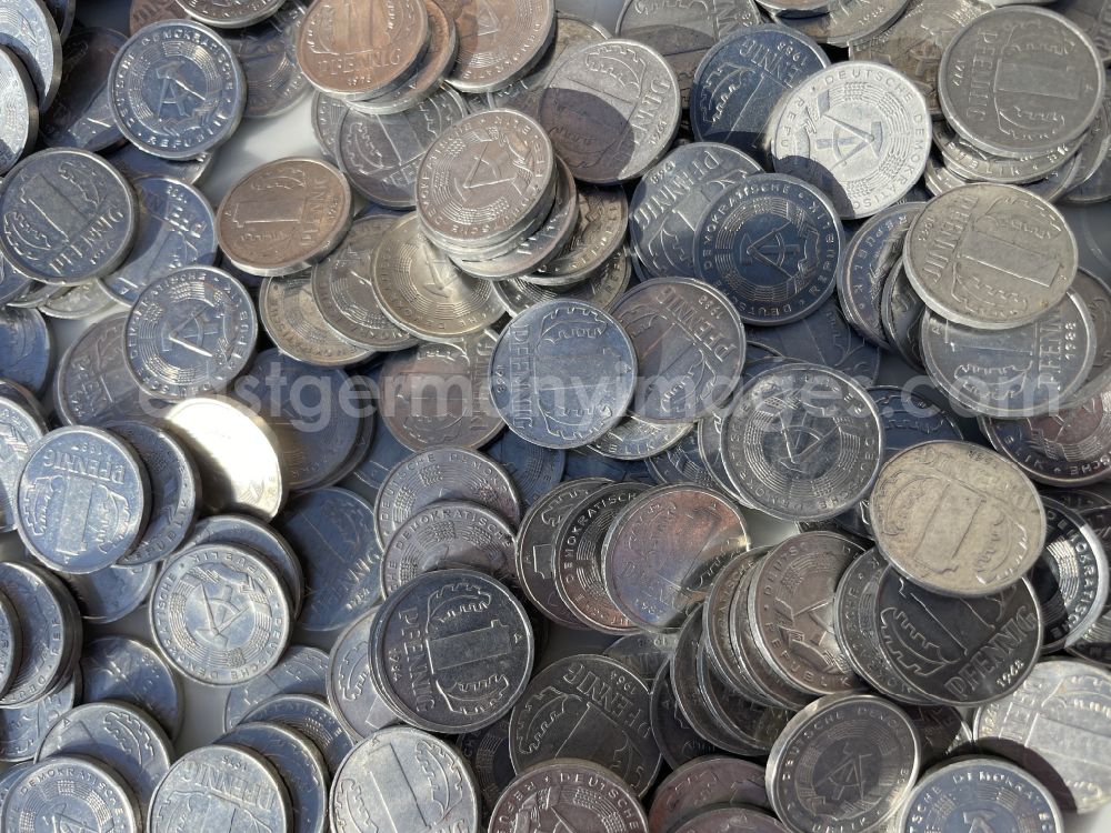 GDR photo archive: Berlin - Various small change coins with a nominal value of one Pfennig as legal tender and currency put into circulation by the State Bank in Berlin East Berlin in the territory of the former GDR, German Democratic Republic