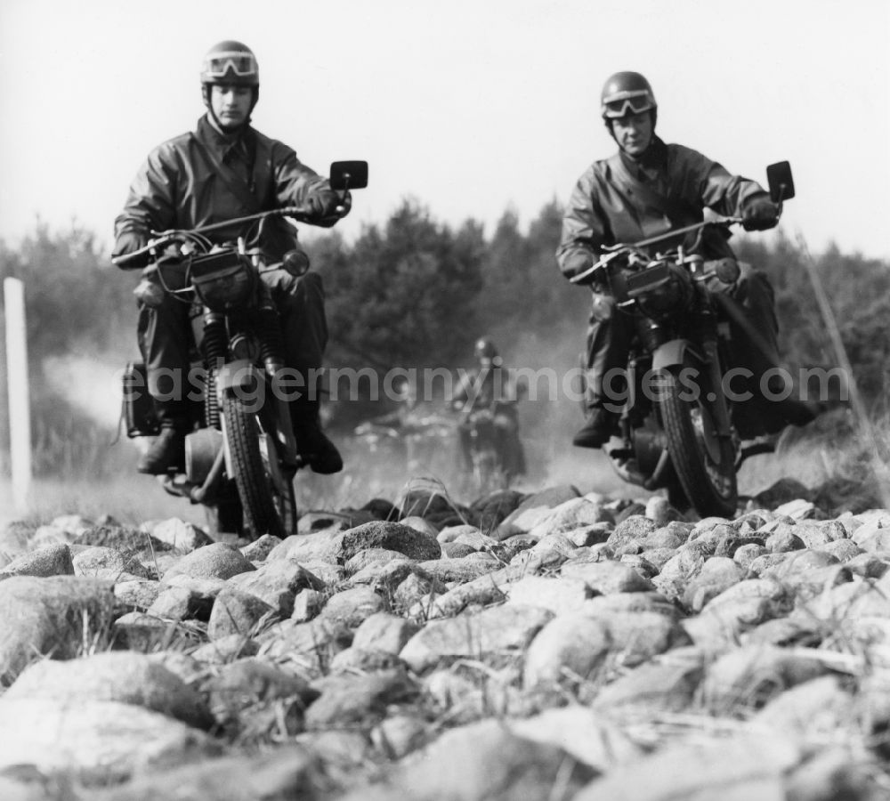 Abbenrode: Motorized border guards on MZ motorcycles during a patrol ride near Abbenrode in Harz in today's federal state of Saxony-Anhalt