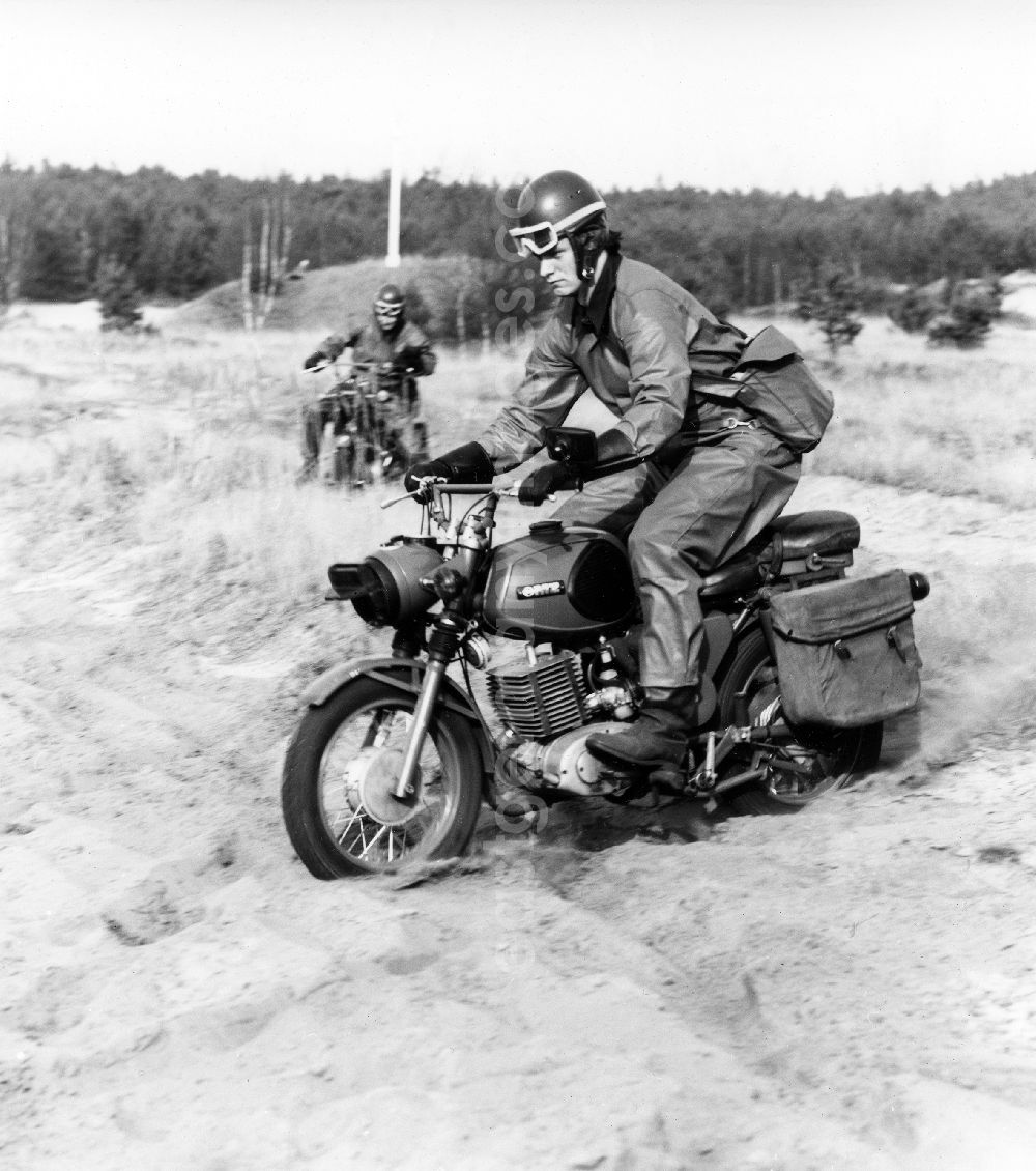 GDR picture archive: Abbenrode - Motorized border guards on MZ motorcycles during a patrol ride near Abbenrode in Harz in today's federal state of Saxony-Anhalt