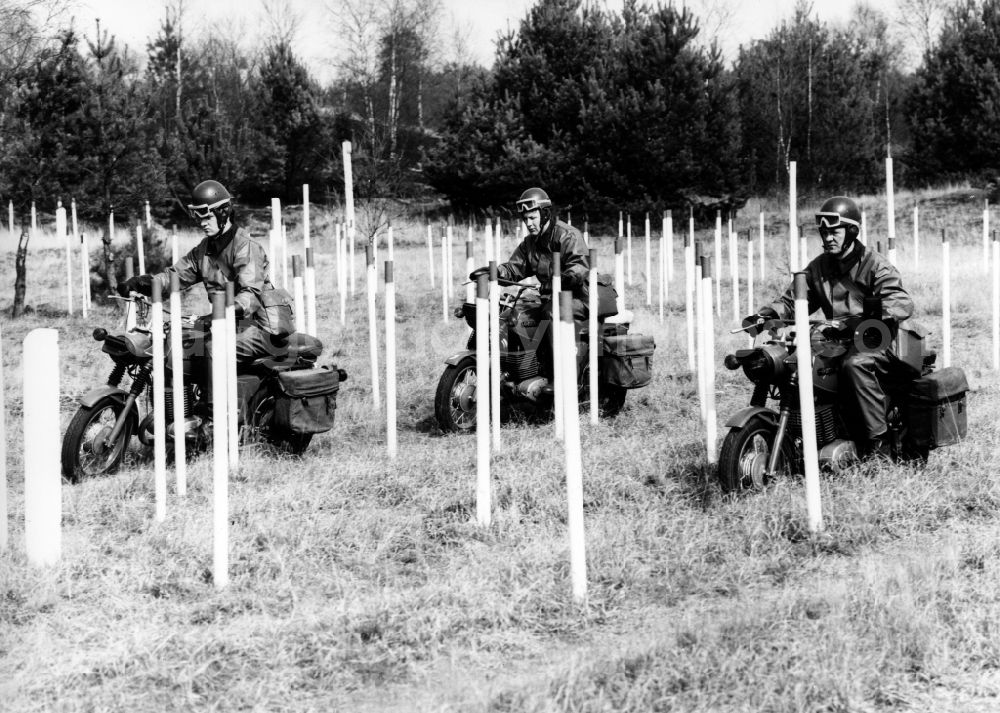 GDR photo archive: Abbenrode - Motorized border guards on MZ motorcycles during a patrol ride near Abbenrode in Harz in today's federal state of Saxony-Anhalt