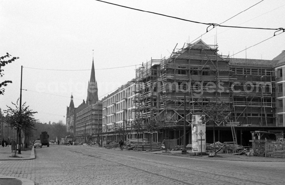 Dresden: New buildings on the Borsbergstrasse in the Striesen district in Dresden in the state Saxony on the territory of the former GDR, German Democratic Republic. In the background, the Church of the Sacred Heart with its steeple